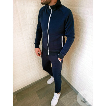 Теплый синий спортивный костюм на микрофлисе с контрасными белыми змейками. Теплый синий спортивный костюм на микрофлисе с контрасными белыми змейками.